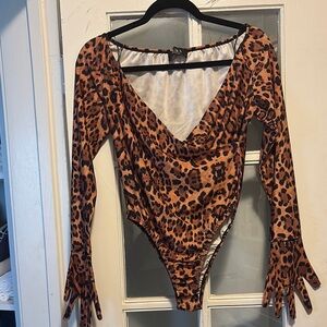 AKIRA Brown and Black Asymmetrical Long Sleeve Bodysuit